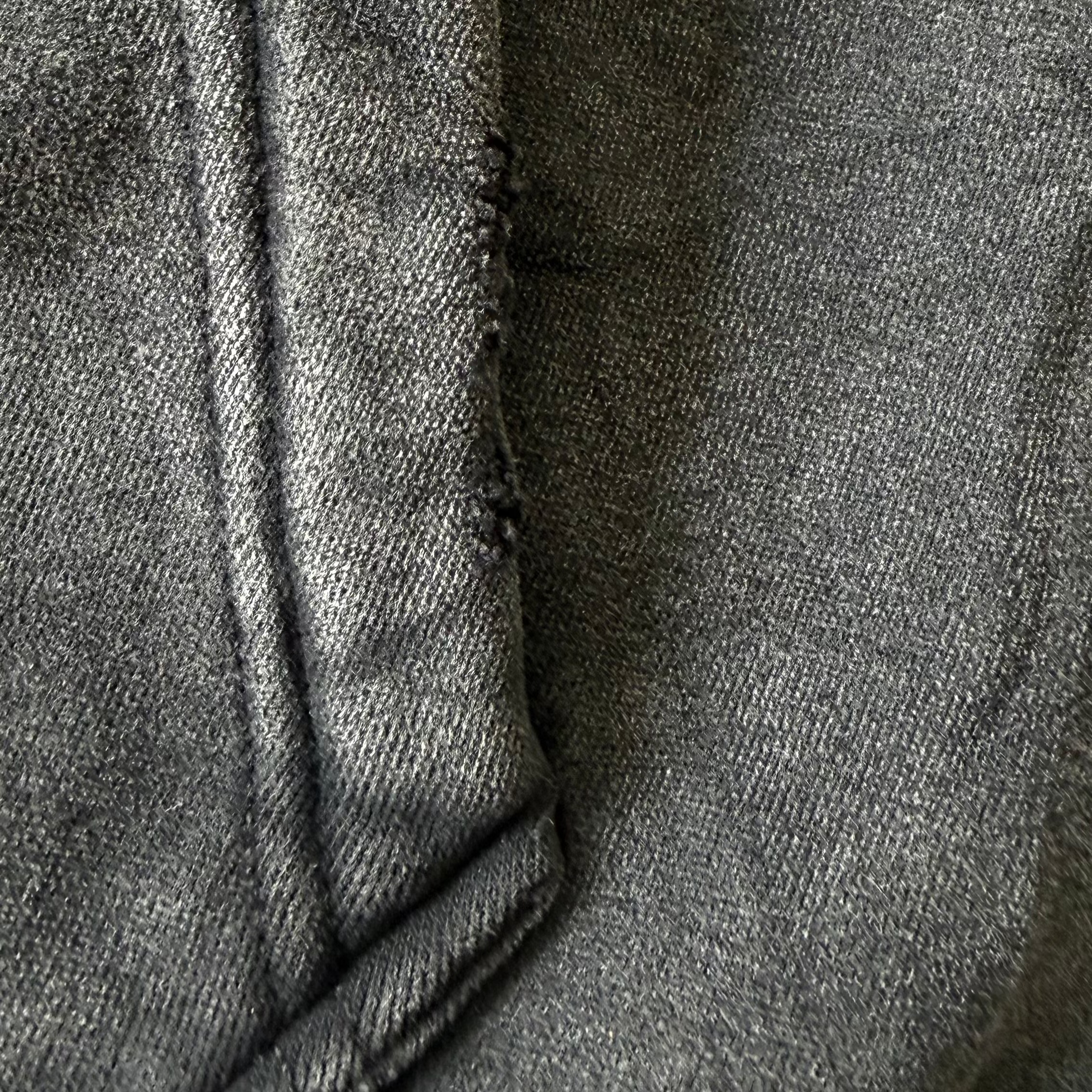 Black Aquaholics hoodie pocket detail close up
